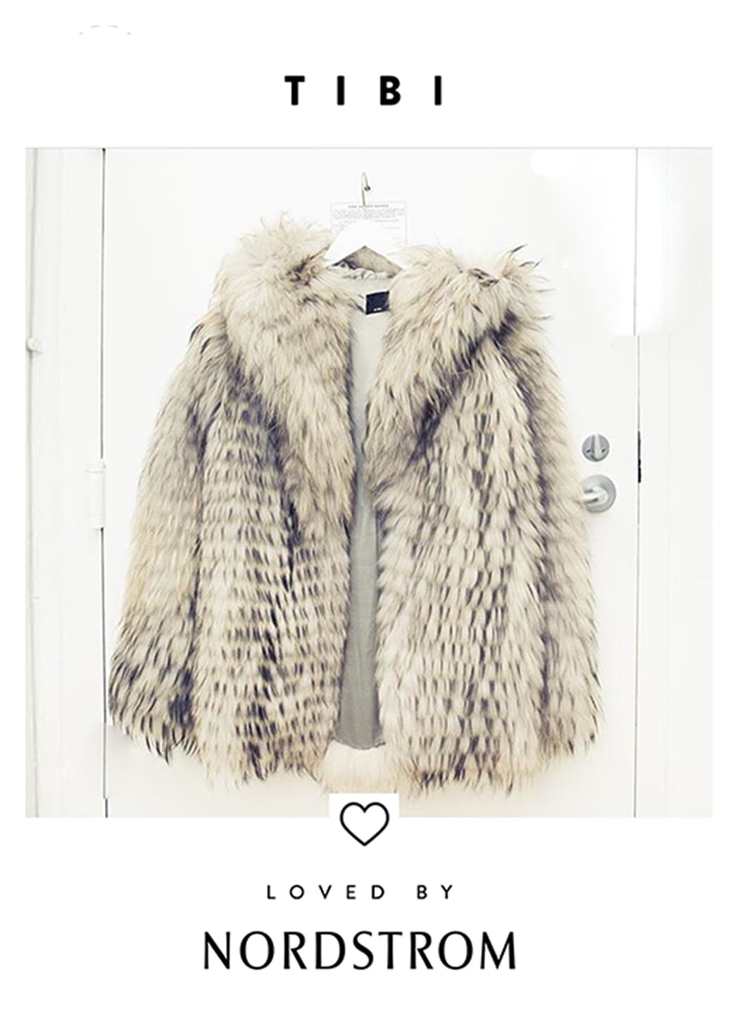 Loved by Nordstrom large format tile featuring TIBI faux fur coat on white door