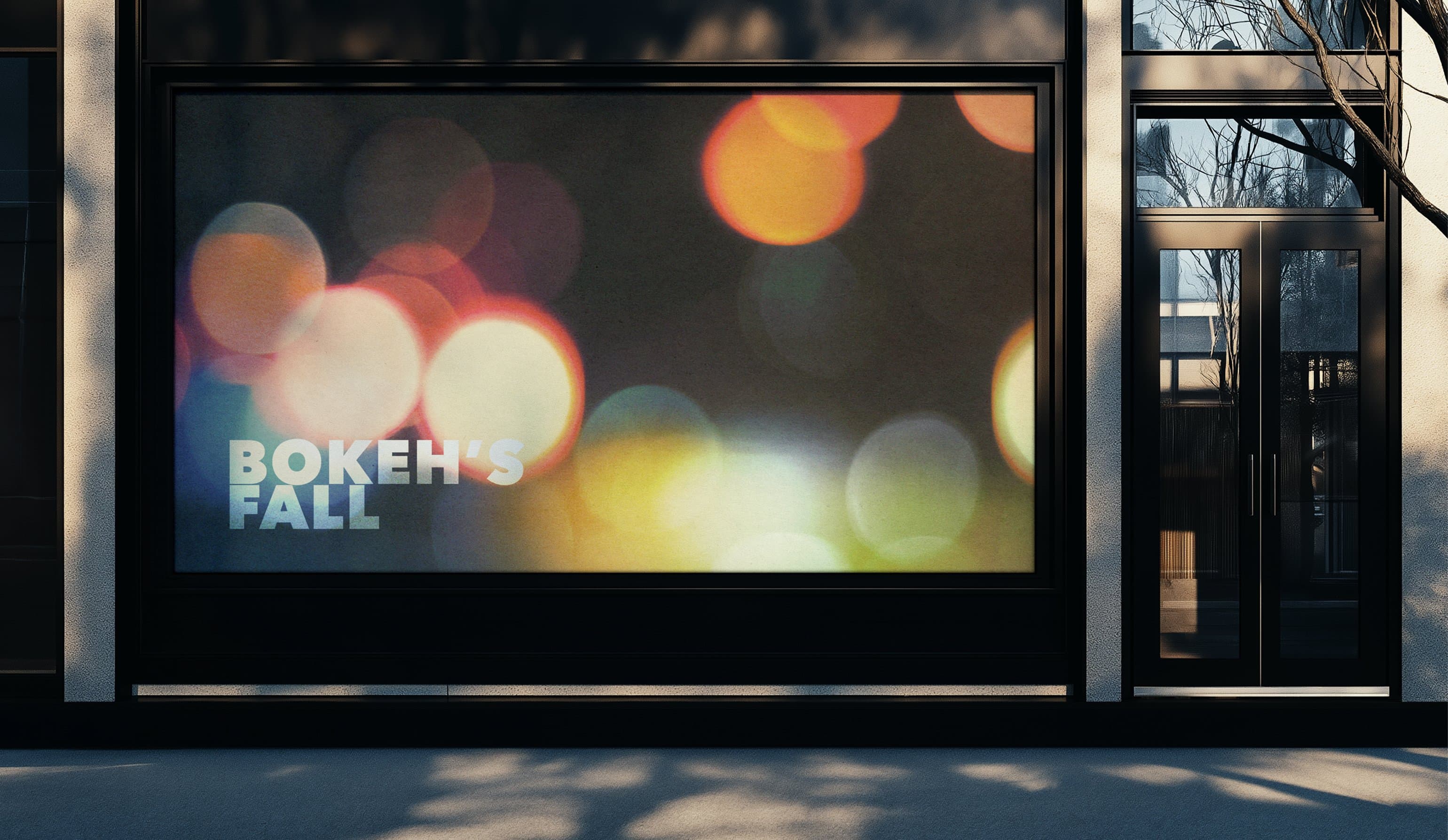 Bokeh's Fall storefront window display, large bokeh light photograph with overlay typography in modern building