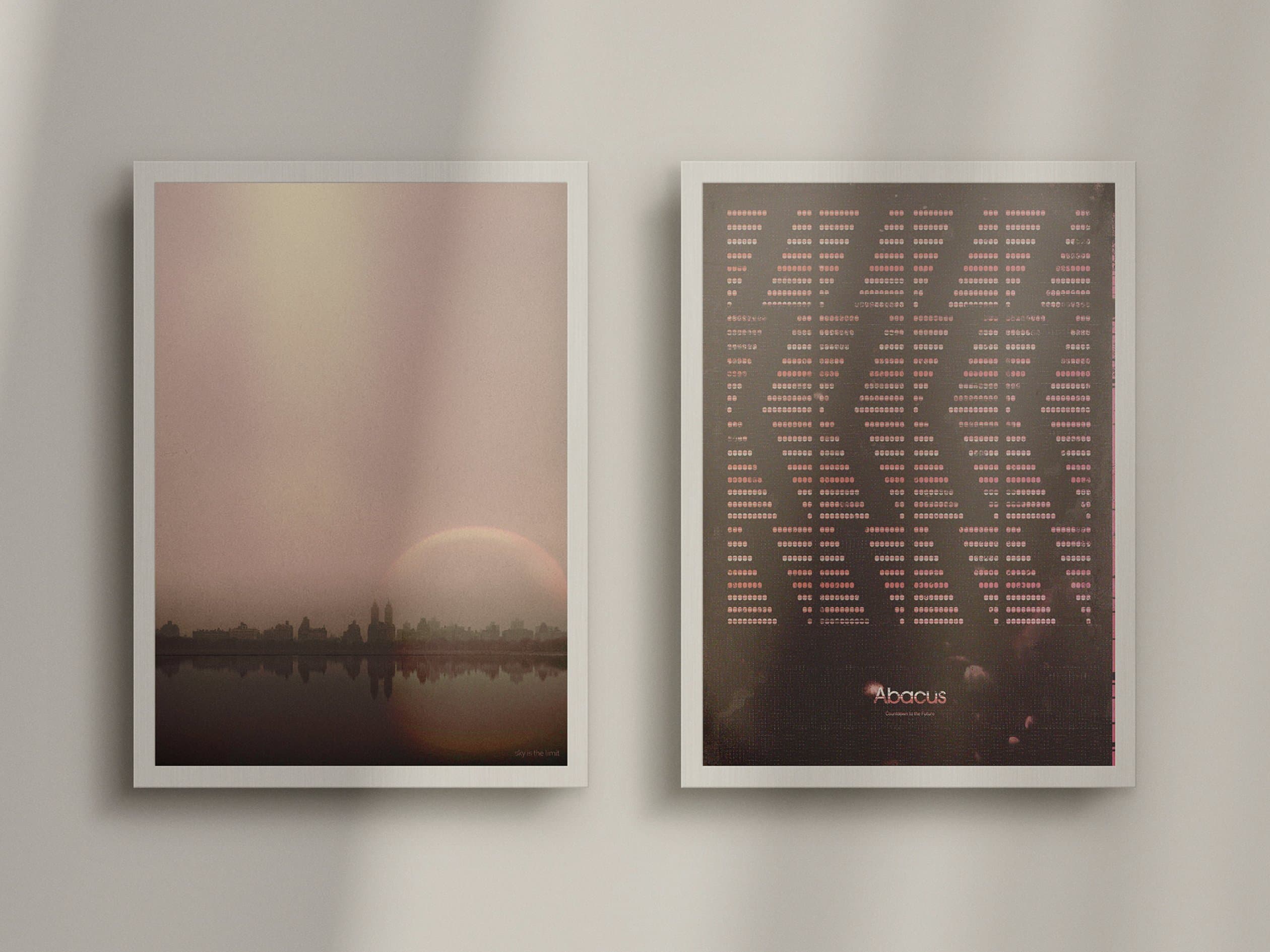 Sky is the Limit cityscape poster paired with Abacus halftone dot poster, framed and hung on neutral wall