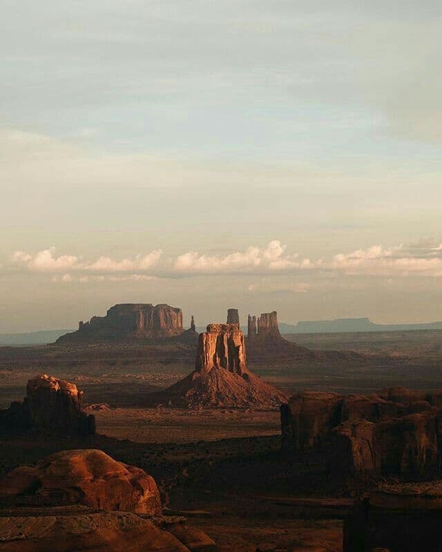 Monument Valley mittens at dawn under low cloud cover
