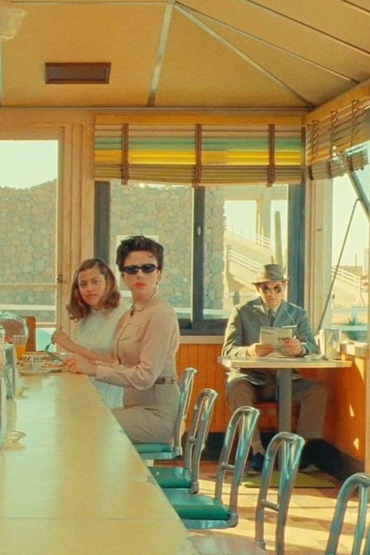 Asteroid City film still, three figures at a 1950s diner counter