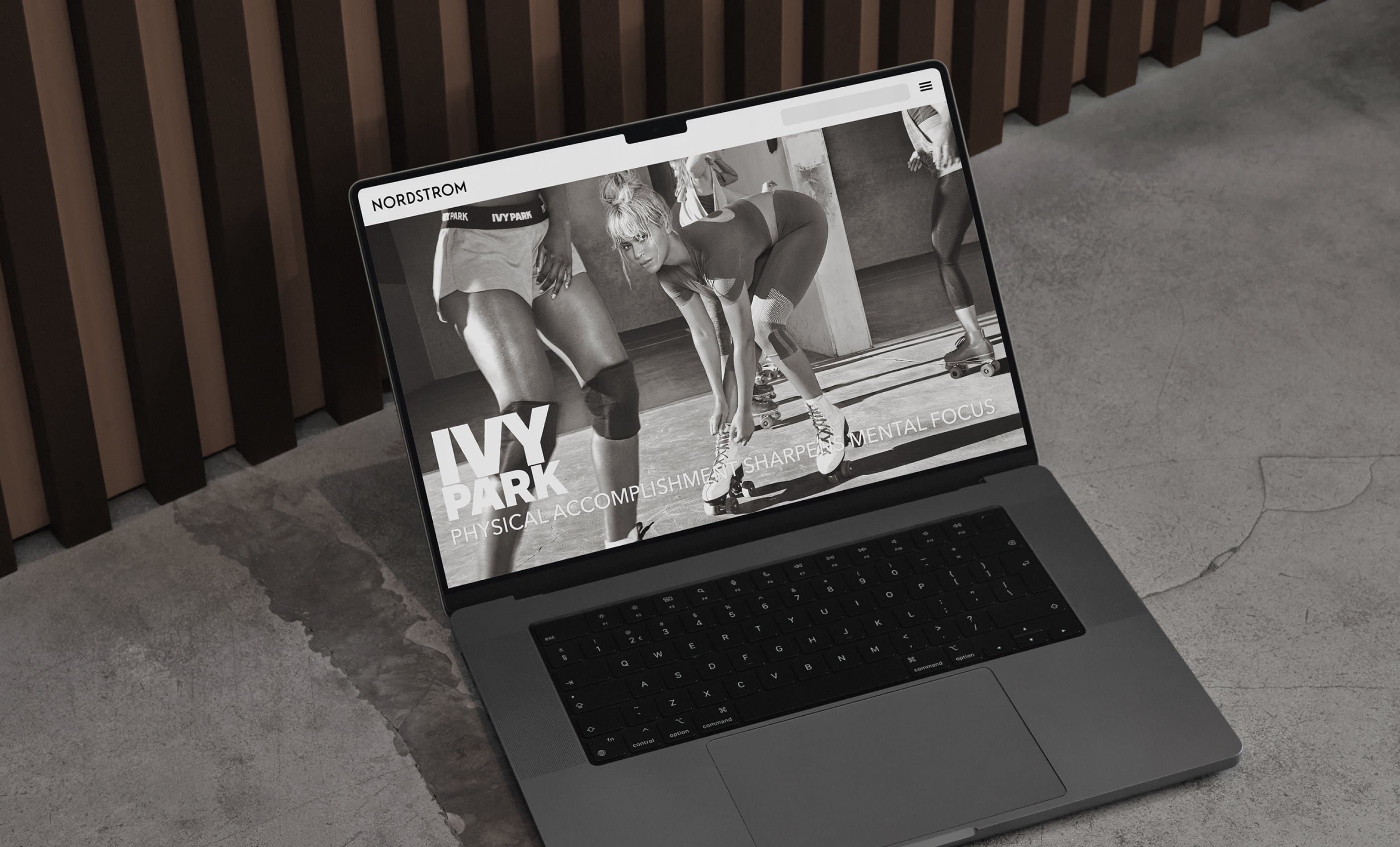 Ivy Park by Beyoncé, Nordstrom brand experience on laptop, concrete surface