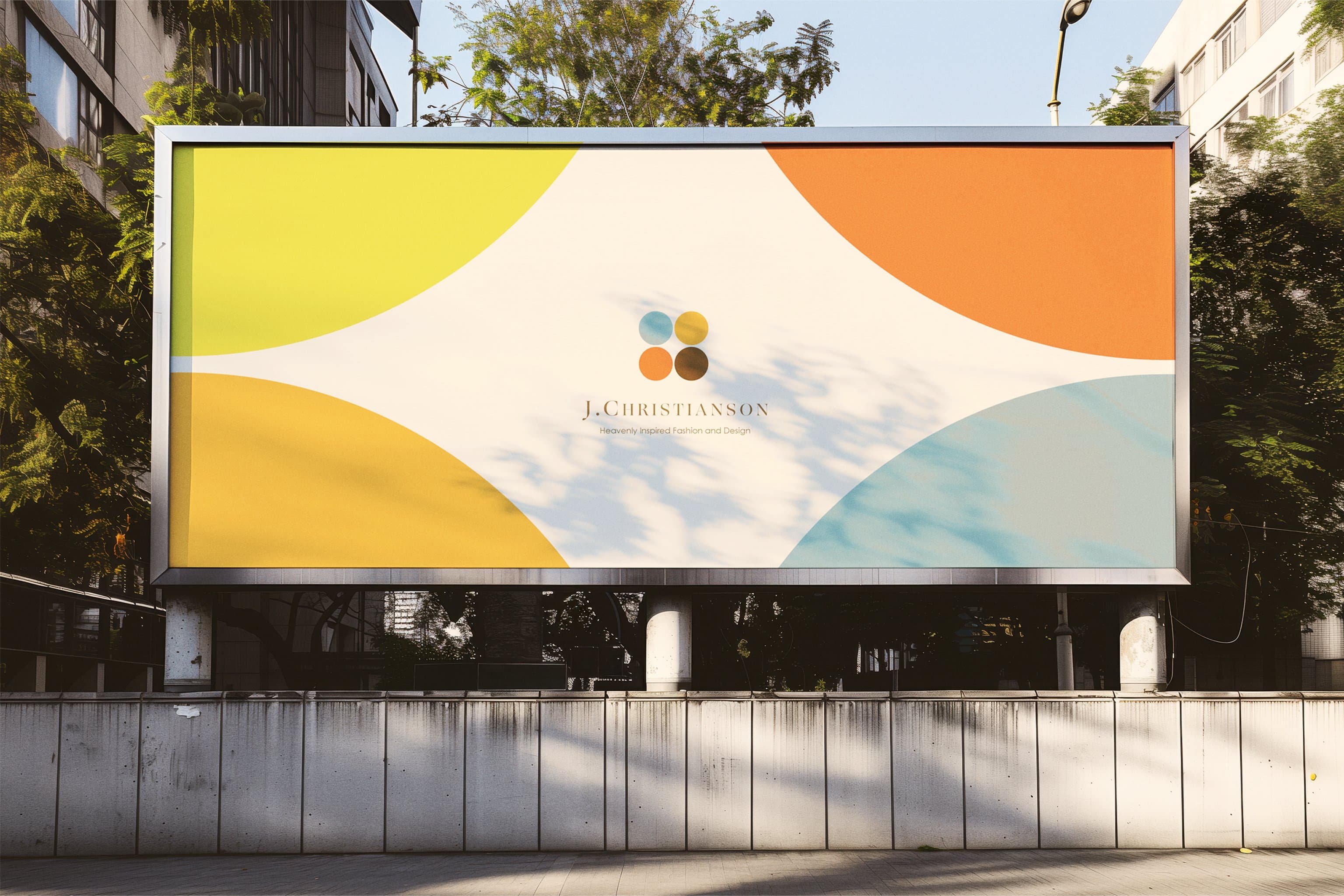 J. Christianson brand identity on billboard, organic color shapes with four-dot logo
