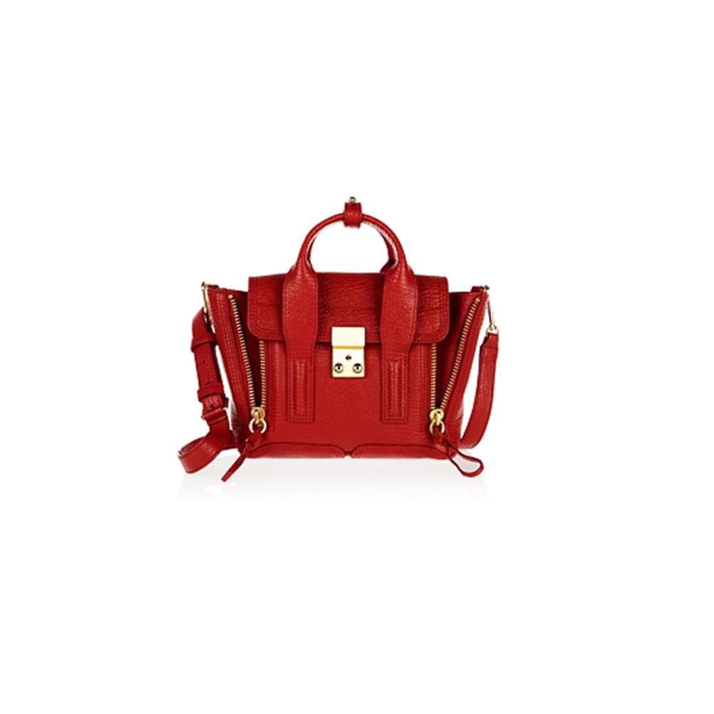 Red leather Phillip Lim Pashli satchel handbag on white background