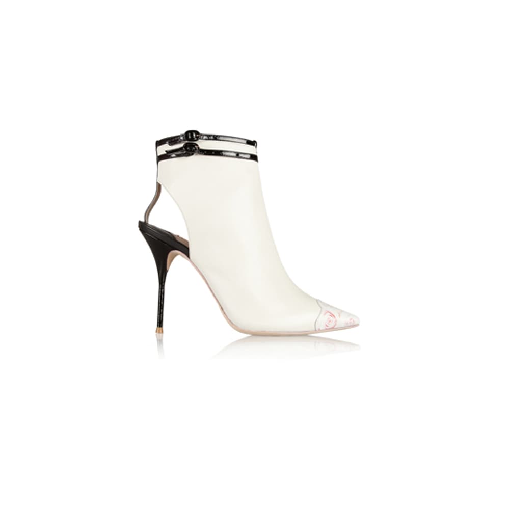 White leather double-strap pointed slingback stiletto heels on white background