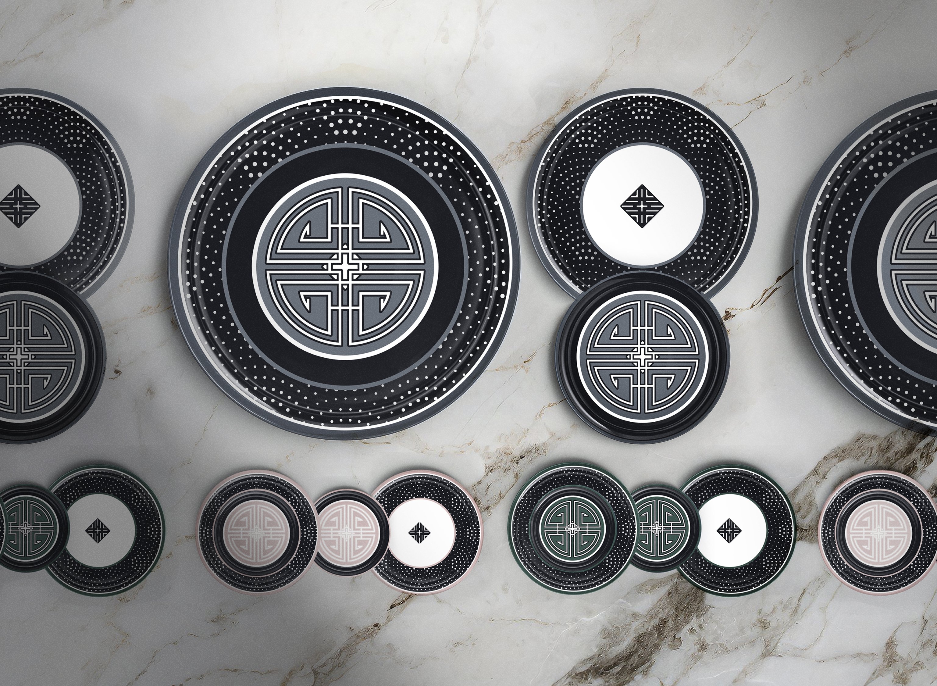 Black linework collection, geometric plates on marble surface in charcoal and silver