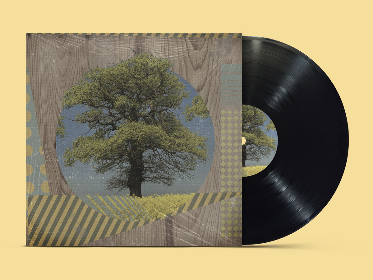 Blue in Green album cover, tree silhouette over woodgrain with collage textures, vinyl sleeve mockup
