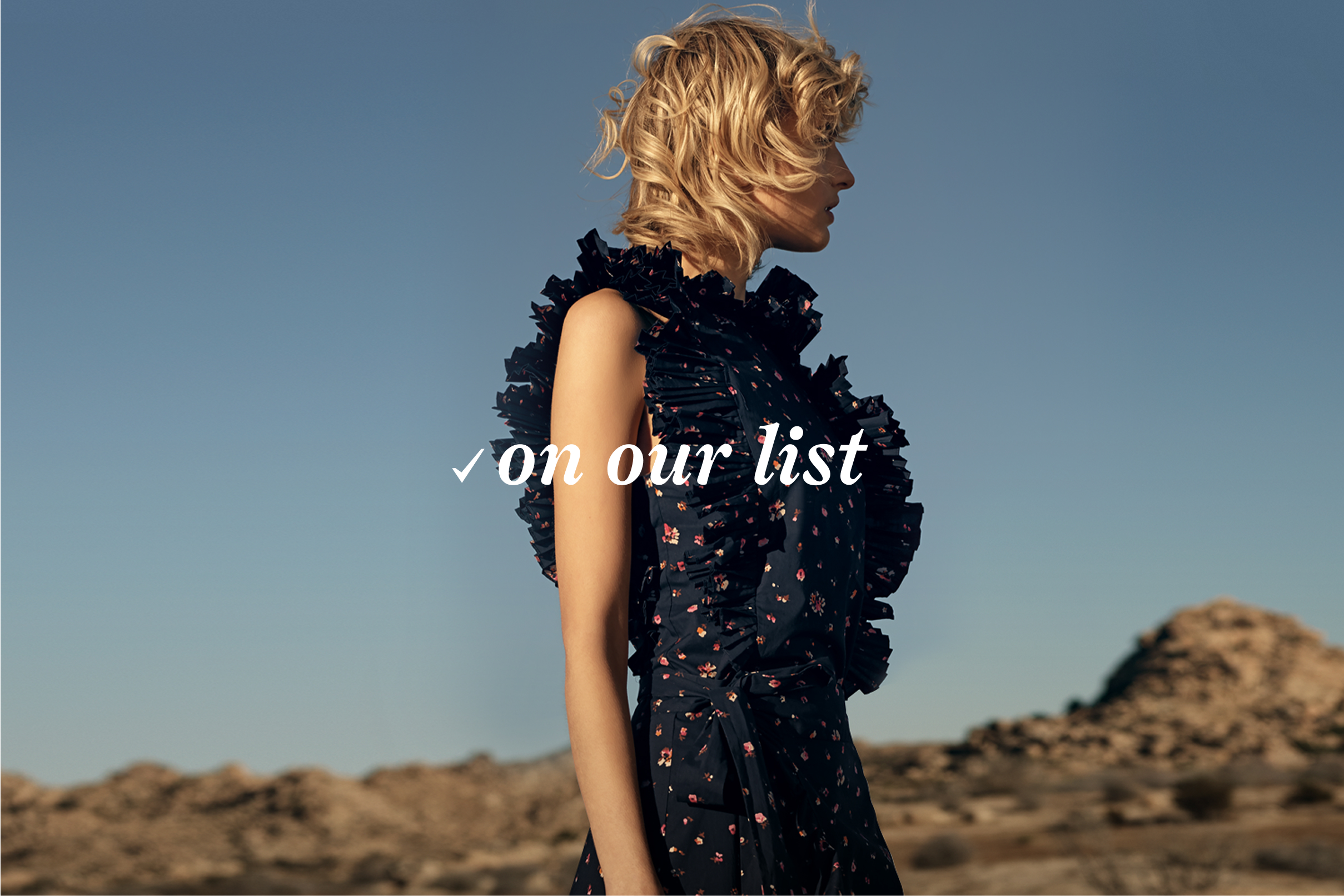 On Our List lockup, custom typographic mark with a check over desert editorial photography